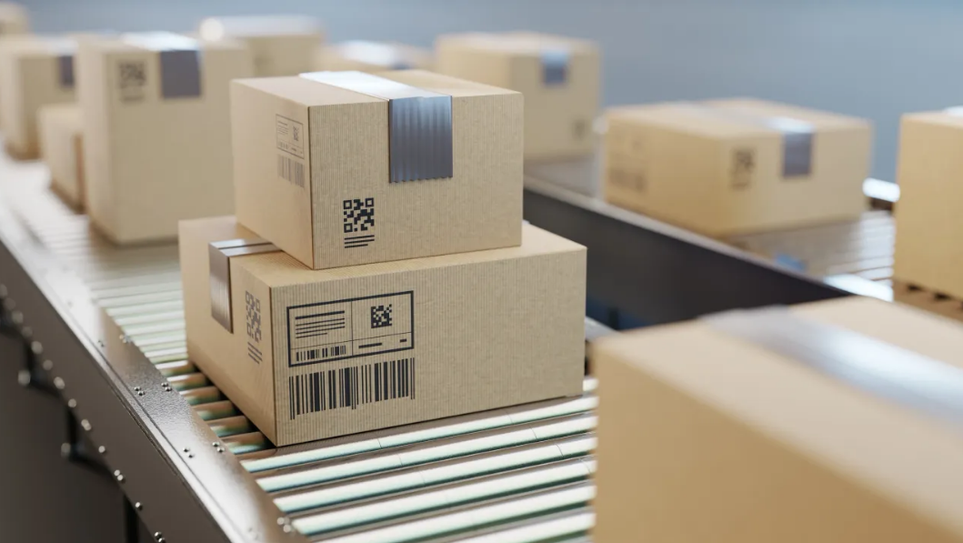 Cardboard boxes on logistics conveyor belt